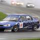 Nigel Mansell drives a Ford Mondeo in a 1998 British Touring Car Championship round held at Donington Park.